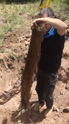 Man Clearing Blocked Drain