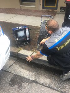Plumber Fixing Drainage | Plumbing and Electrical