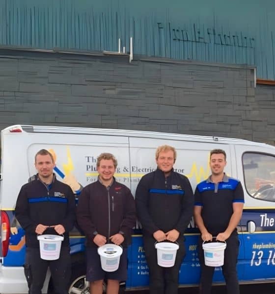 Plumbers Holding Bucket