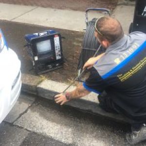 Plumber Fixing Drainage | Plumbing And Electrical