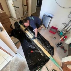A Plumber Getting Ready for a Plumbing Job
