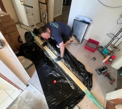 A Plumber Getting Ready for a Plumbing Job