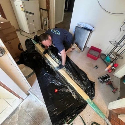 A Plumber Getting Ready for a Plumbing Job