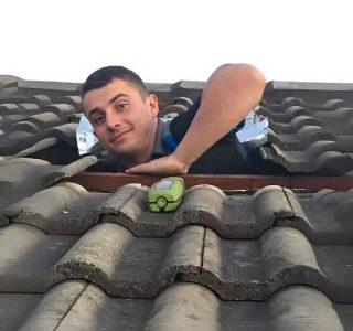 Plumbers Working in Roof