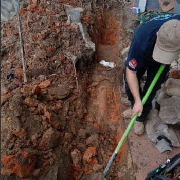 Plumbers Working on the Broken Drain