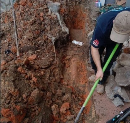 Plumbers Working on the Broken Drain