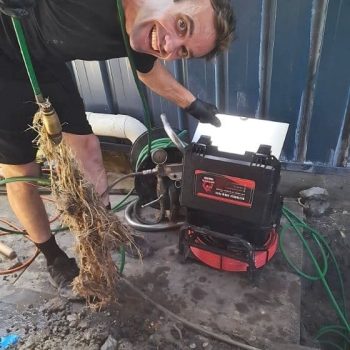 Man Using Water Jetter