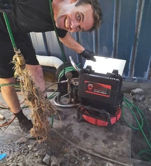 Man Using Water Jetter