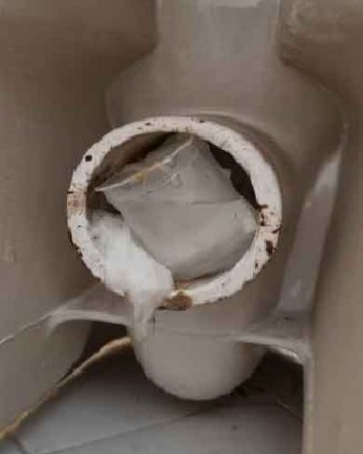 Plastic Cup Blocking A Toilet