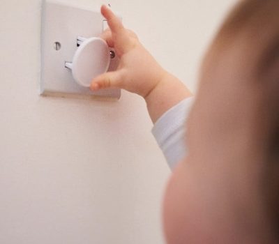 Toddler Playing Power Socket